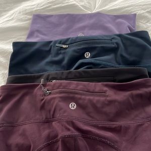 4 pairs size 4 lululemon leggings blue, purple maroon , black